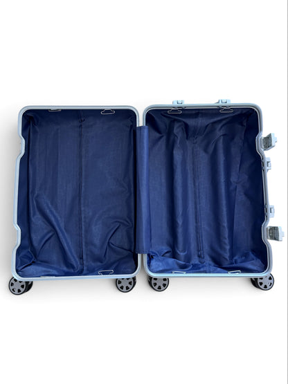 Talo 20-inch carry-on suitcase open to show the spacious blue fabric-lined interior with silent spinner wheels.