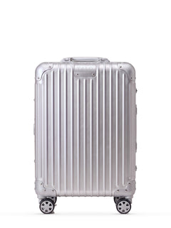 TALO The Cabin aluminum carry-on, front view, ribbed silver shell with the engraved TALO nameplate.